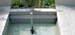 Teich mit Brunnen im Garten - Granitplatten